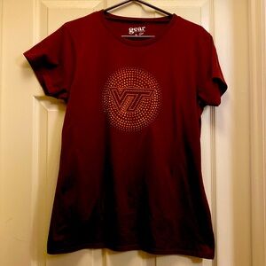 Women’s Virginia Tech T-Shirt with orange rhinestones. In great condition.